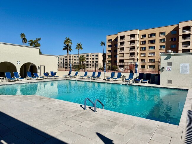 Building Photo - Amazing 2 Bedroom/2 Bath Condo!  Top Level Corner Unit with Spectacular Amenities!