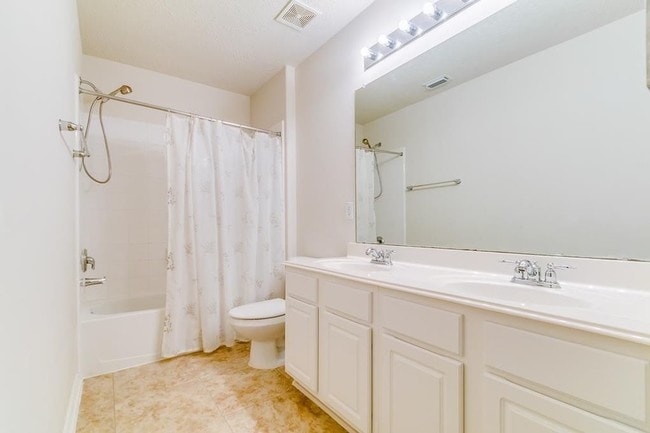 Building Photo - 8310 Coriander Ln