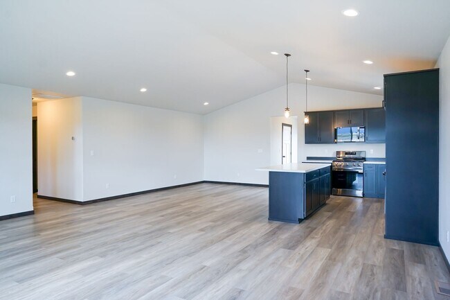 Building Photo - Brand New with 3 car garage