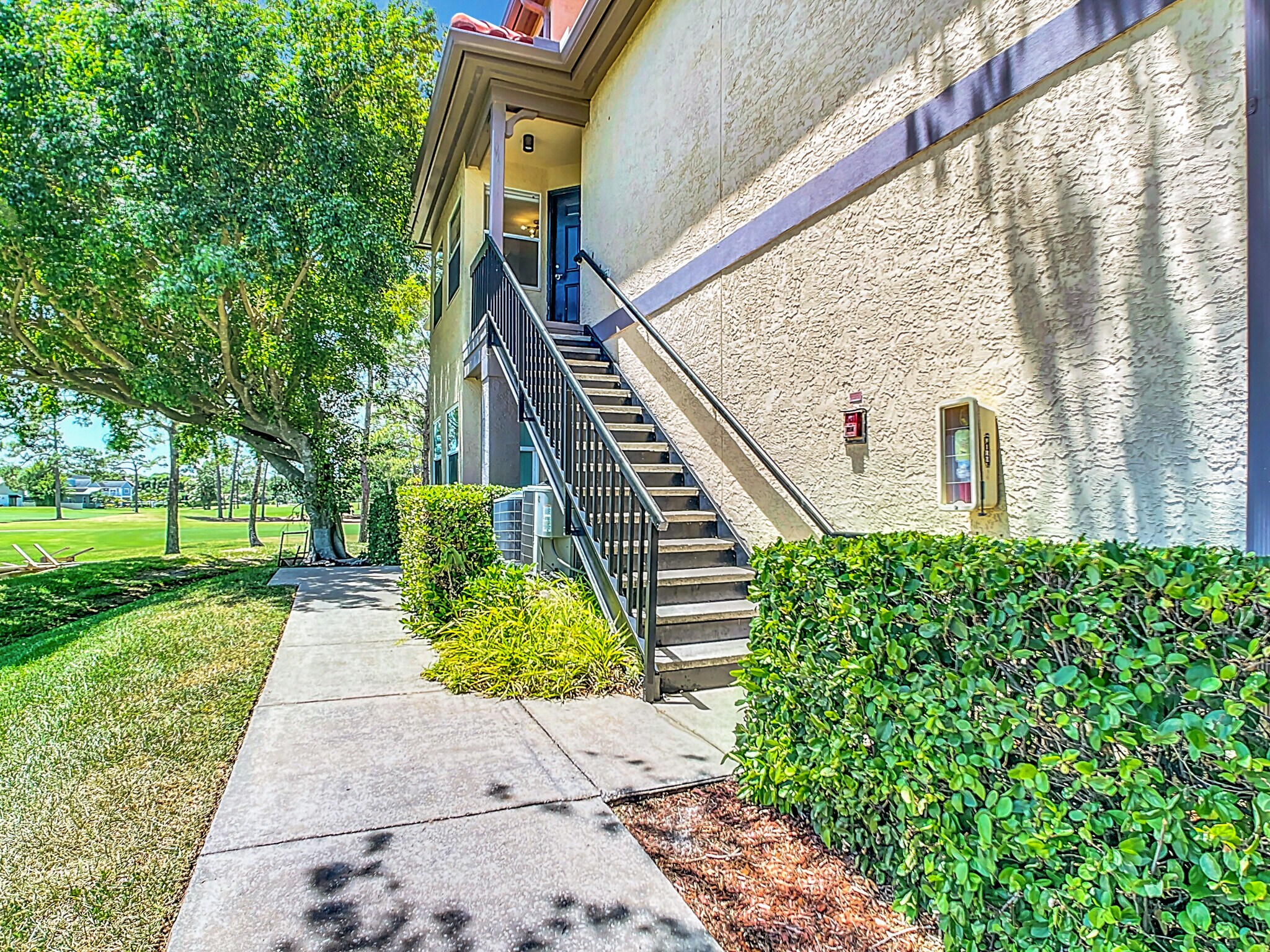 Private Entrance, second story - 2400 Feather Sound Dr Apt 421
