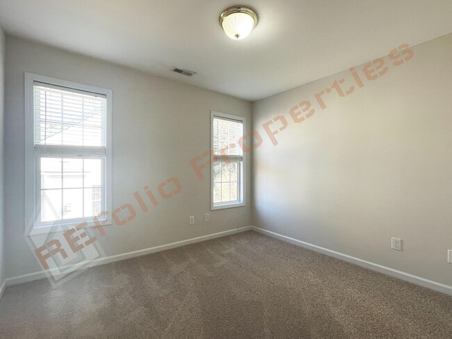 Building Photo - Freshly Painted 4-Bedroom Home with New Ca...