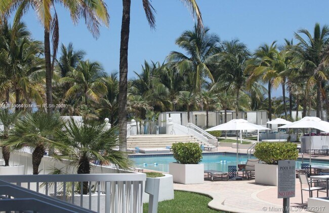 Building Photo - 10275 Collins Ave