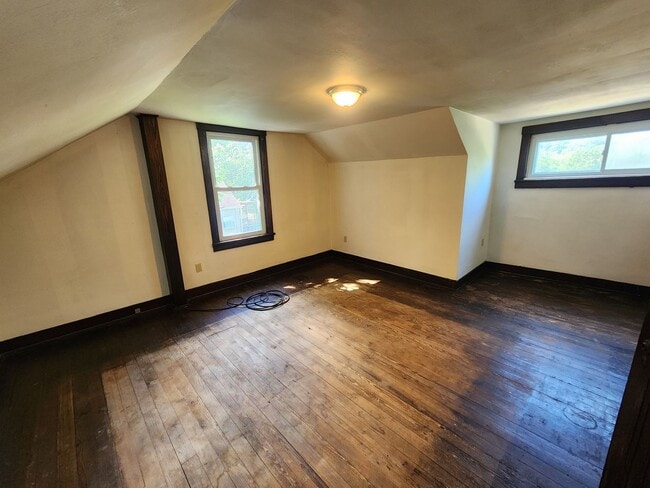 Building Photo - 4 BR home with first-floor living, new roof, and a private-feeling backyard in Lincoln Place