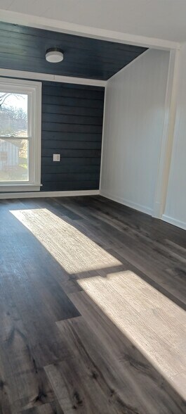 (2 Bedroom Apt) Living Room/ Den with closet storage - 86 N Blettner Ave