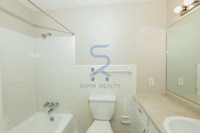 Building Photo - Move in before January 31st and choose your reward: a $250 Amazon Gift Card or a 55" Smart TV!