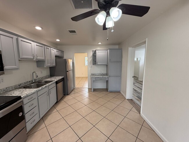 Building Photo - 4 Bedroom Home with Large Backyard | Modern Landscaping | Utilities Included