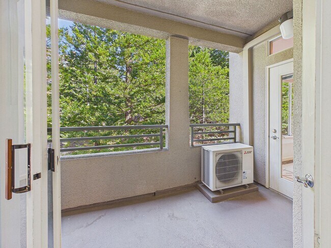 Building Photo - Stylish & Updated 1BD/1BA Condo in Secure Caldecott Community – Parking + In-Unit Laundry