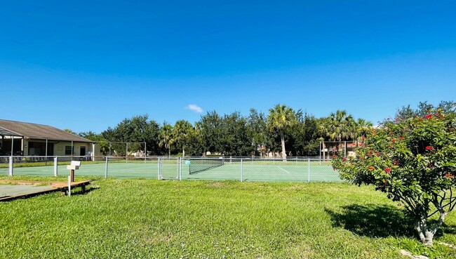 Building Photo - **TALA LAKES-55YR COMMUNITY**