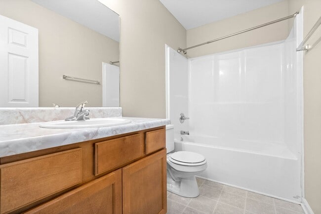 Building Photo - Pet Friendly Three Bedroom with Bonus!