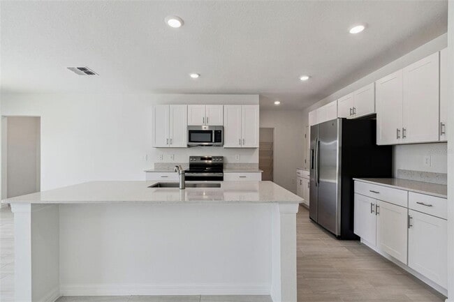 Building Photo - 1712 Tropical Oasis Ave