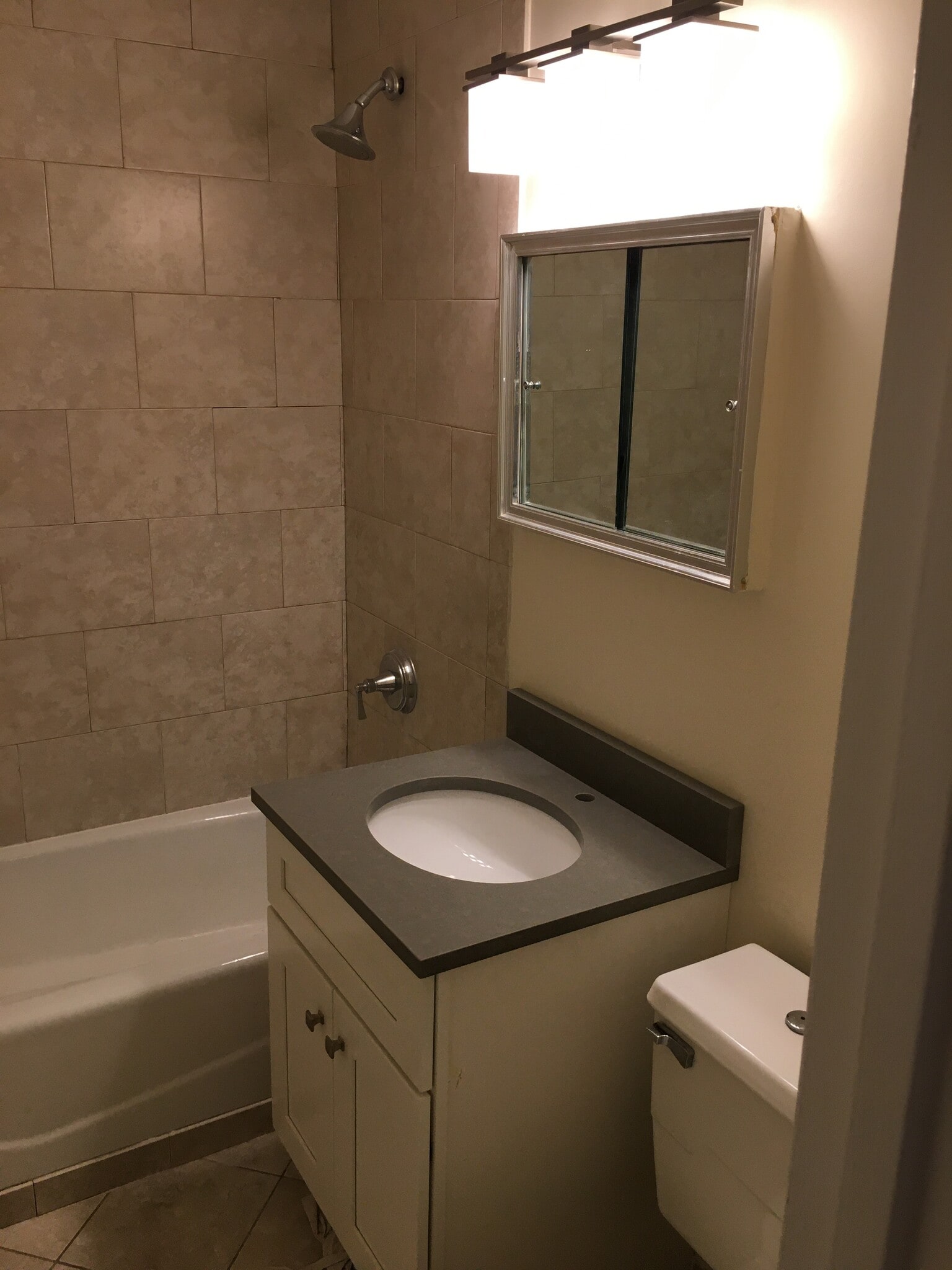Bathroom vanity, counter matches kitchen - 27 Northill St