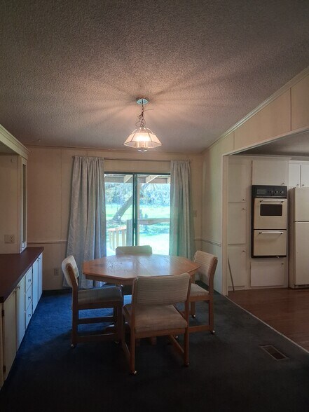 Sliding doors overlooking pastures - 11900 SW 121st Ave