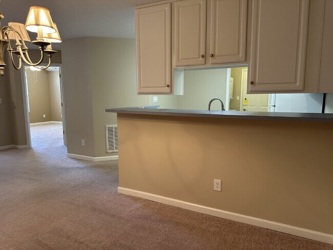 Building Photo - Well-Maintained Condo with 2 Bonus Rooms & Attached 2-Car Garage