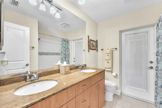 Building Photo - 1012 Spindle Palm Way