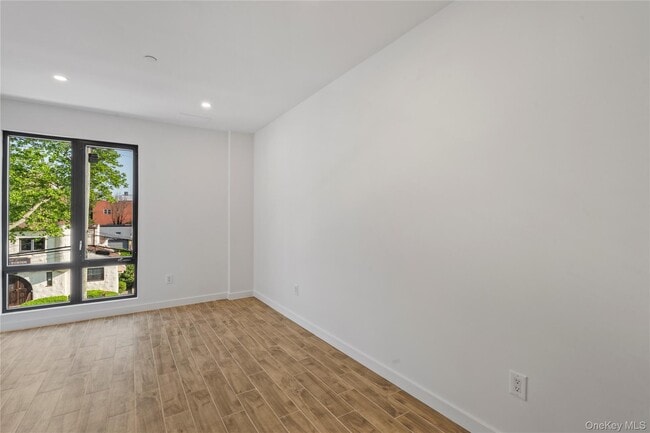 Building Photo - 213-41 38th Ave