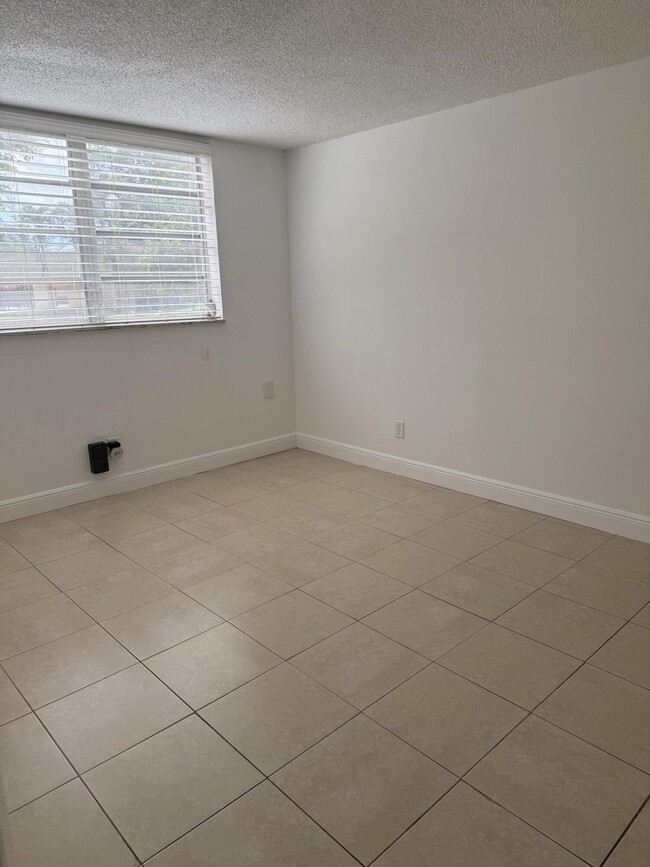 Building Photo - 5750 NW 64th Ave