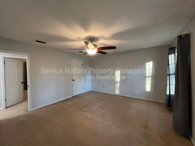 Building Photo - 6004 Players Pl