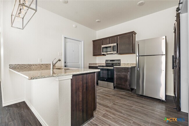 Building Photo - 5121 Rose Petal Ct