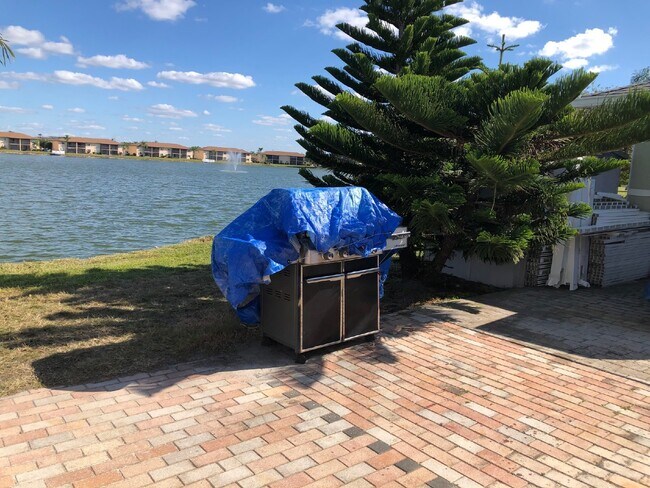 Building Photo - "Charming 2-Bed, 2-Bath Villa with Stunning Lake View"