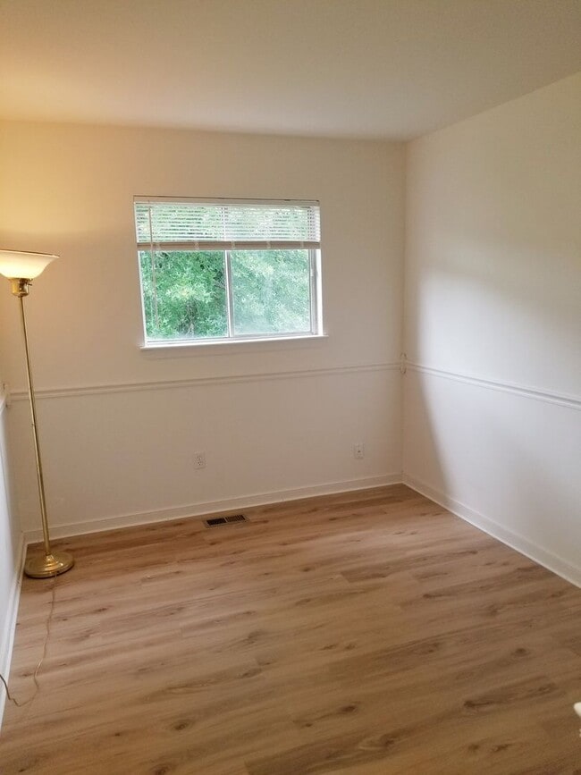 Building Photo - A spacious 3-Bedroom 1.5-Bathroom 3 Story Townhouse off of Old Forest Road With a Pool