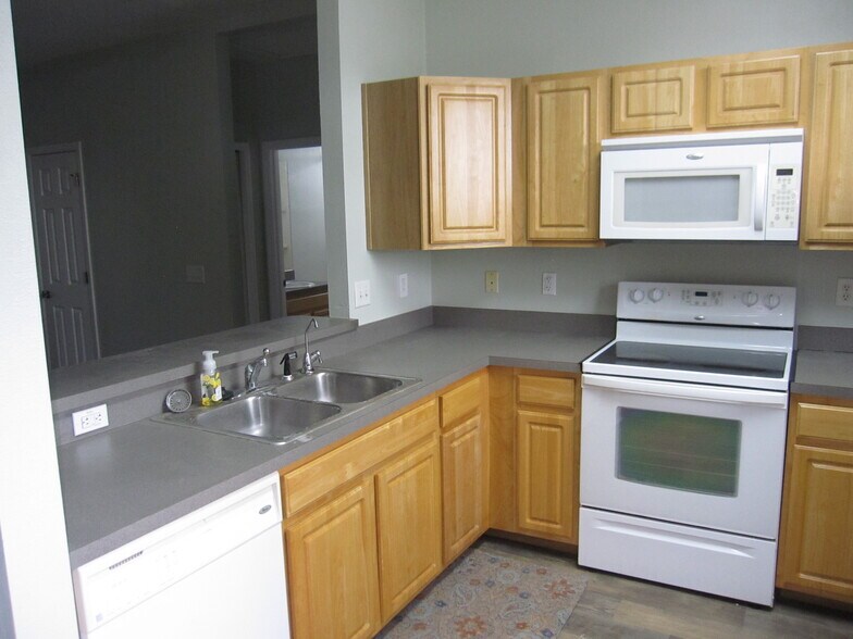 Pass thru & above range microwave - 6144 Abbott Station Drive