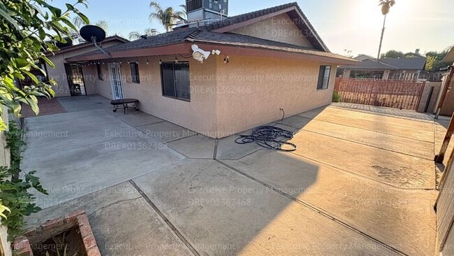 Building Photo - 3 bedroom 2 bathroom home on a corner lot with extra fenced parking.