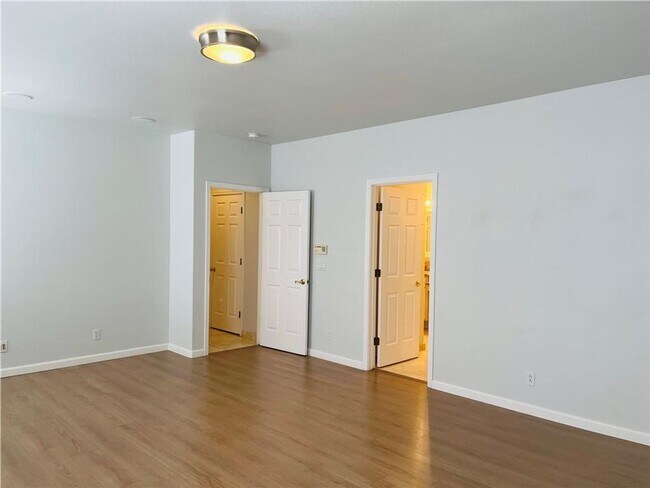 Building Photo - Amazing condominium in gated upscale neigh...
