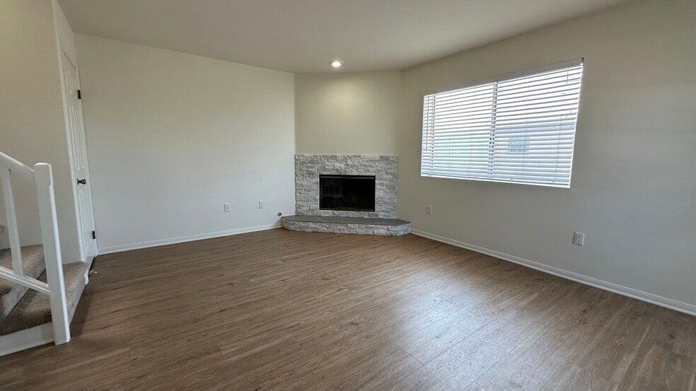 Light, bright, & airy living room with balcony. - 939 Sapphire St