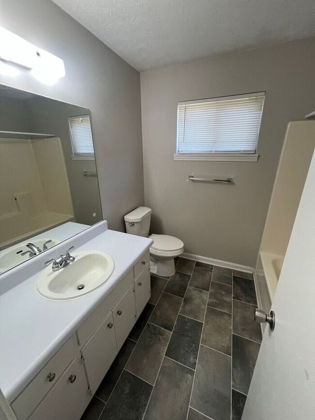 Building Photo - Ready Now!!! 2 bedroom 1.5 bath townhome off of Lenora Church Rd.!!