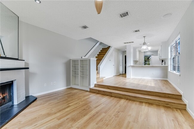 Main area downstairs - lots of end unit light - 1804 Capital Pky