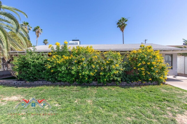 Building Photo - 8119 E Amelia Ave