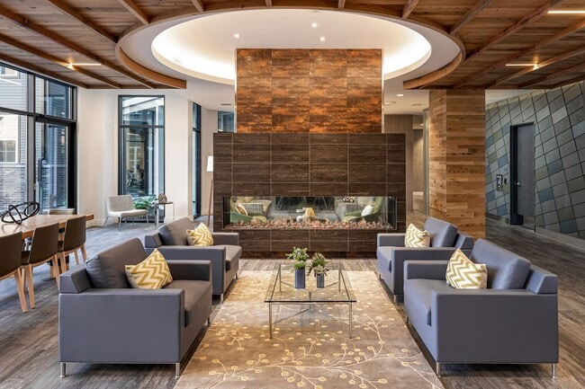 Cozy up by the fireplace in the Entertainment Lounge - Edison on the Charles by Windsor