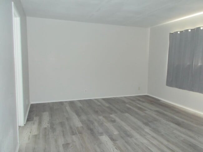 Building Photo - Spacious 4-Bedroom, 3-Bathroom Home with Open Floor Plan & Large Backyard – Prime Location!