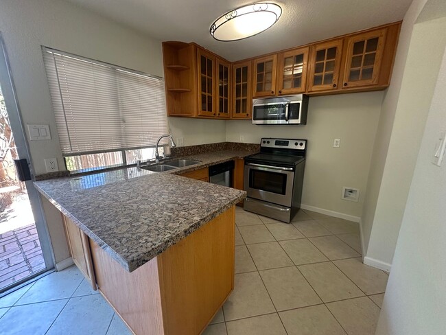 Building Photo - Updated 3 Bedroom 2 Bathroom Townhome with...