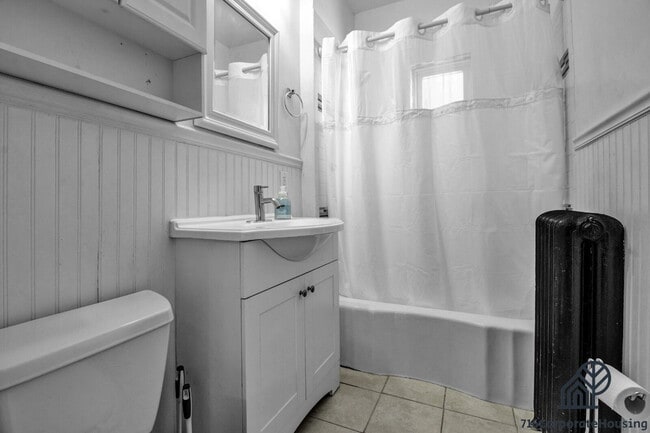Building Photo - Furnished 2-Bedroom First-Floor Apartment Near Elmwood Village