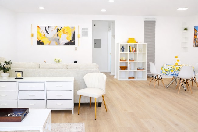 New Hardwood Floors, New Furniture, and New Lighting - 5860 Hazeltine Ave