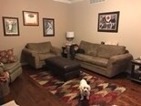 Family room includes gas fireplace, Pella slider, and hardwood throughout. - 1809 Stark Drive