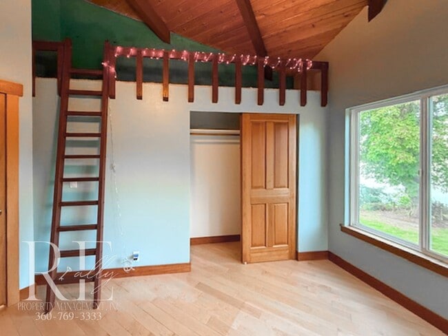 Building Photo - Waterfront Rustic Retreat with Vaulted Ceilings, Picture Windows & Lofted Nook