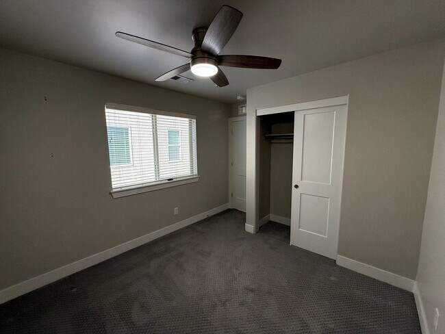 Building Photo - Modern Townhouse with Rooftop Deck & Mountain Views Near Sloan’s Lake!!