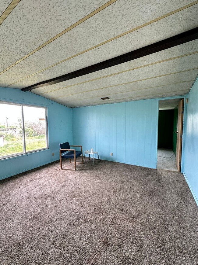 Building Photo - 4 Bedroom & 2 Bathroom Mobile Home in Wate...