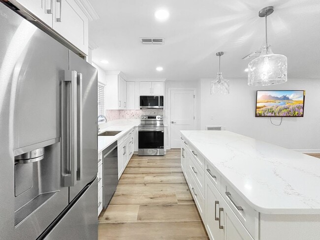 Building Photo - Amazing Indian Rocks Beach Waterfront Rental – Dock, Boat Lift & Garage! 3bed | 2bath