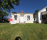 Building Photo - Charming 2 Bedroom, 1 Bath Home – Refinished Hardwood Floors, Detached Garage & More!
