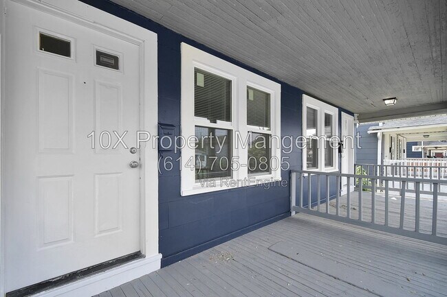 Building Photo - 1311 E 24th Ave