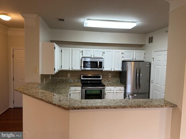 Building Photo - 1550 Spring Gate Dr.