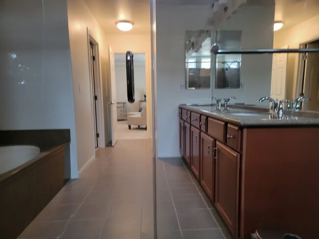 Building Photo - 4 bedroom home with a fully self  contained casita with a 3 car garage