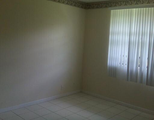 Building Photo - 11458 Royal Palm Blvd