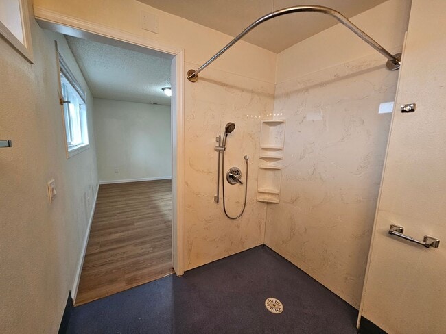 Building Photo - Charming Single-Level Home Featuring New Hardwood Floors, Bright Bedrooms & Open-Concept Living