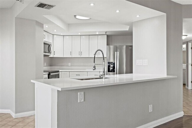 Building Photo - 5950 Pelican Bay Plaza S