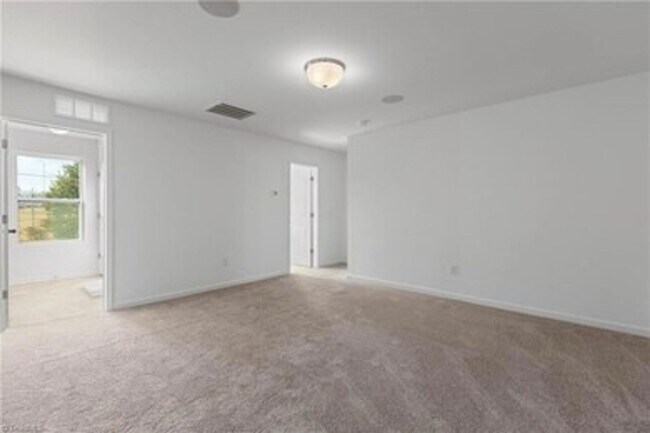 Building Photo - Spacious 3-Bedroom Townhome with Private Patio, Central HVAC & In-Unit Laundry Hookups
