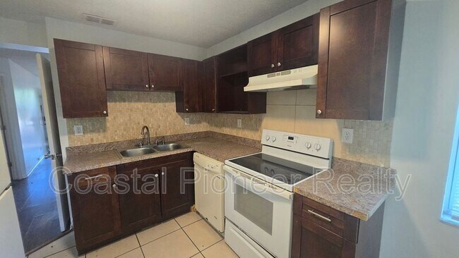 Building Photo - 1308 E 28th Ave